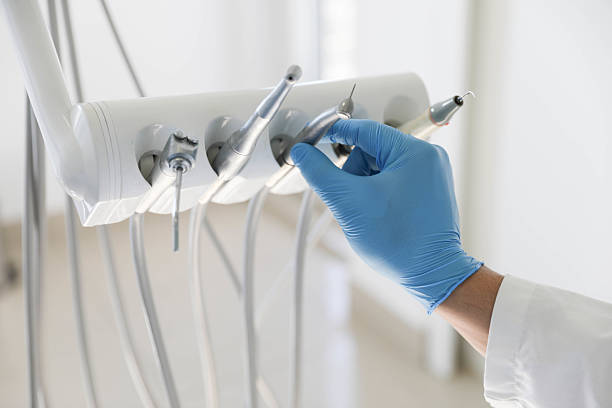 Professional Tooth Extraction technician working in De Baca County County, NM